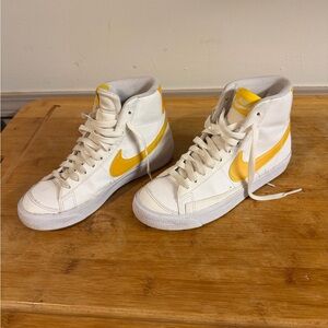 Nike White Sneakers with Yellow and Orange Insole Accents